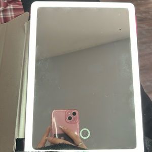 Rechargeable, portable mirror